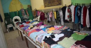 مؤسسة صوارى للتنمية تشارك الأهالى فرحتهم بالعيد بمعرض ملابس مجانى
